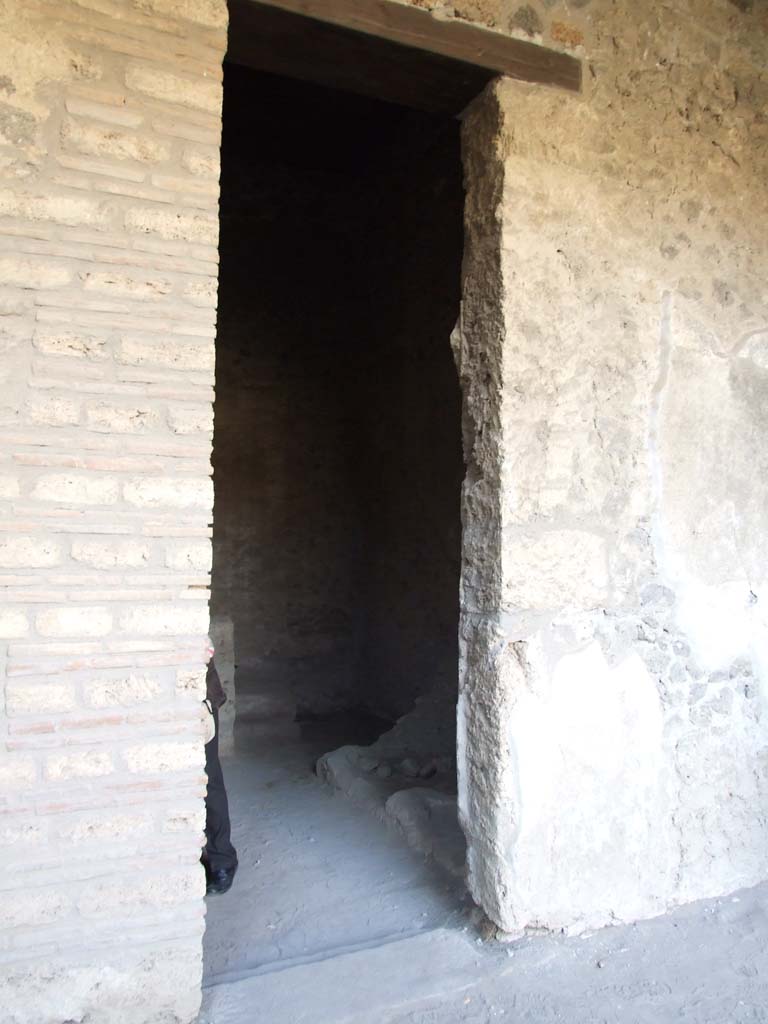 I.15.3 Pompeii. December 2007. Doorway to room 9, kitchen. North side.