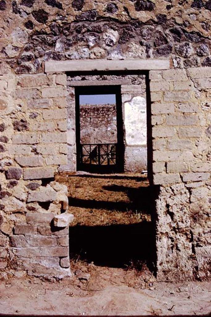 I.15.3 Pompeii. 1972. Looking north through doorway from garden area 14, onto south portico 10.
Photo by Stanley A. Jashemski.
Source: The Wilhelmina and Stanley A. Jashemski archive in the University of Maryland Library, Special Collections (See collection page) and made available under the Creative Commons Attribution-Non Commercial License v.4. See Licence and use details.
J72f0591