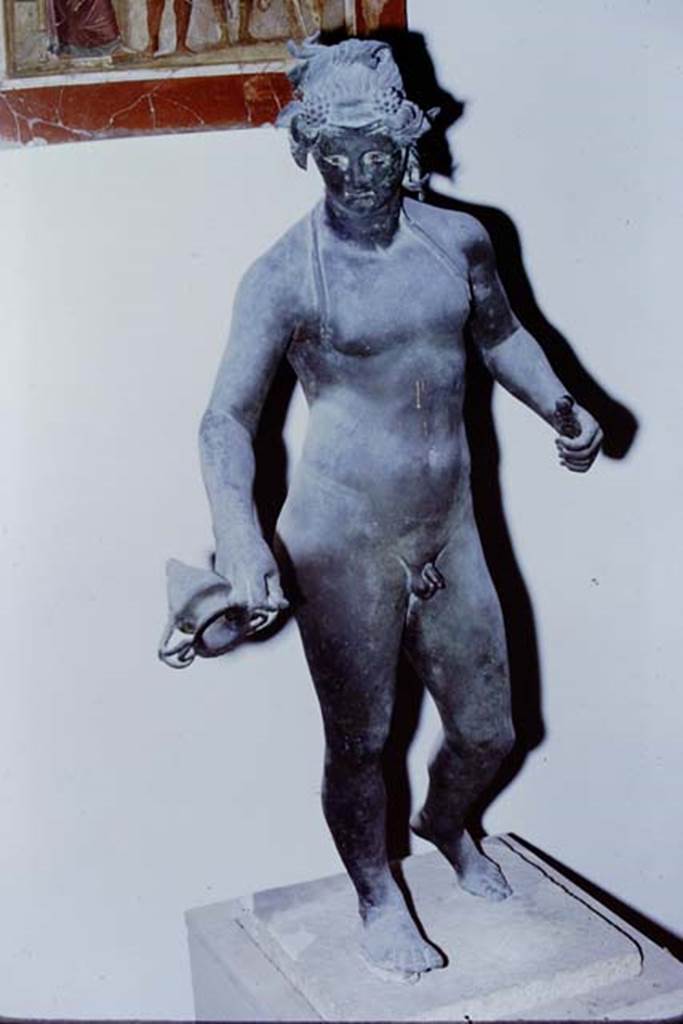 I.16.2 Pompeii. 1971. Bronze statue of Bacchus. SAP 11864. Found 26th September 1957. Photo by Stanley A. Jashemski.
Source: The Wilhelmina and Stanley A. Jashemski archive in the University of Maryland Library, Special Collections (See collection page) and made available under the Creative Commons Attribution-Non Commercial License v.4. See Licence and use details.
J71f0158
