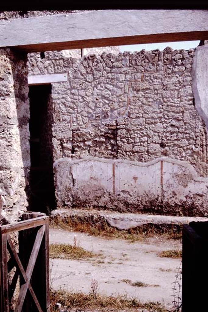 I.16.3 Pompeii. 1964. Looking south across Via di Castricio, towards painted plaster on outside front wall. This was taken from the doorway of I.11.10. Photo by Stanley A. Jashemski.
Source: The Wilhelmina and Stanley A. Jashemski archive in the University of Maryland Library, Special Collections (See collection page) and made available under the Creative Commons Attribution-Non Commercial License v.4. See Licence and use details.
J64f1572