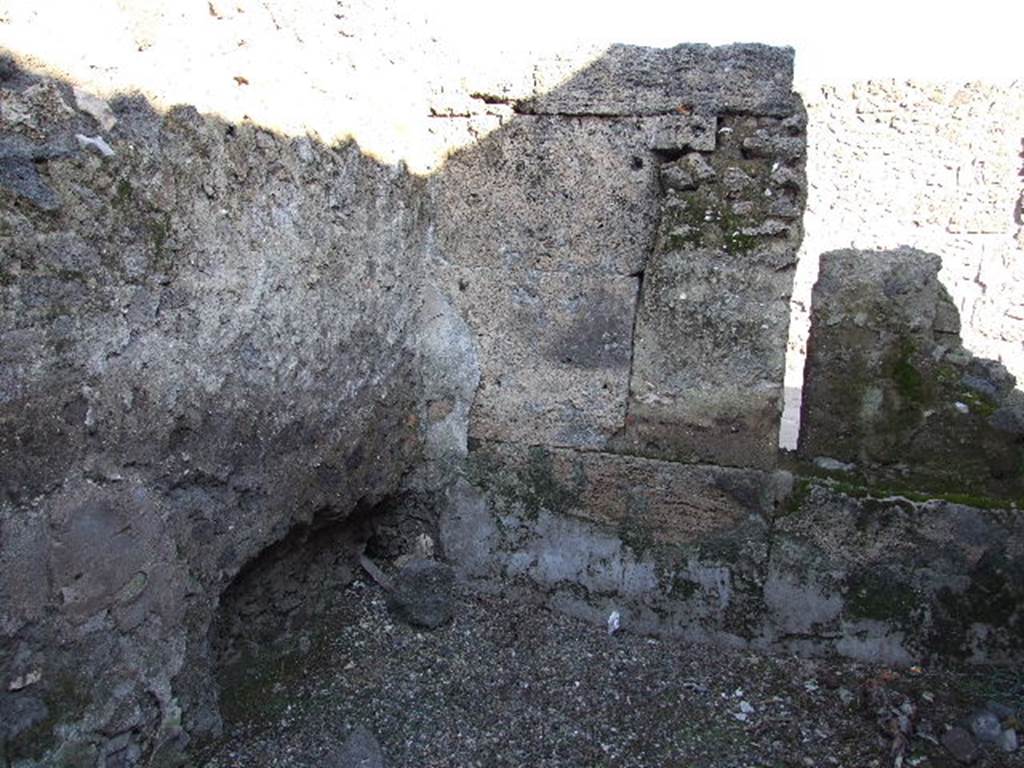 I.16.7 Pompeii. December 2006. North-east corner of room at south end of corridor.