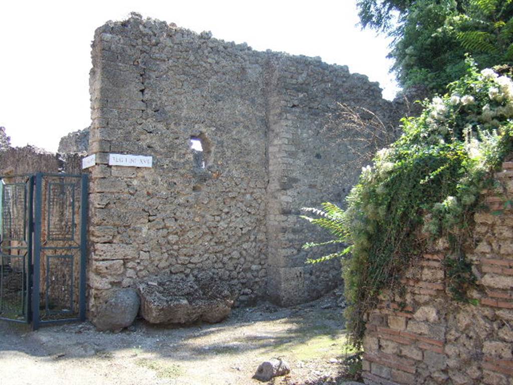 I.17.1 (side wall) on east side of roadway into unexcavated area looking south, with corner of I.18