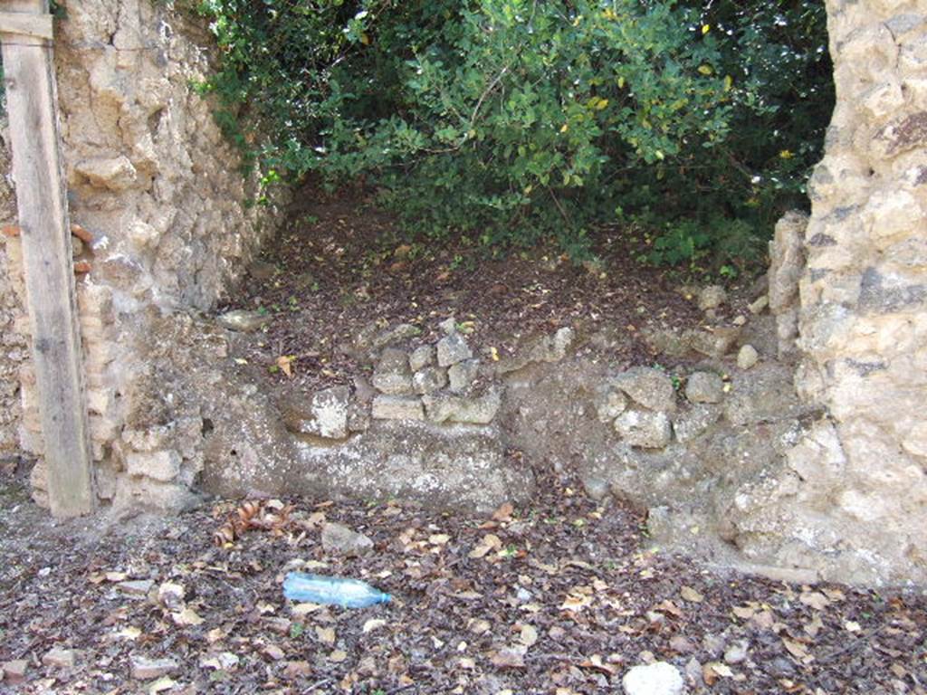 I.19.2 Pompeii. September 2005. Entrance doorway, looking south.
According to Hunink, graffito naming Actius was found on the counter of I.11.2 [=I.19.2]
<B=H>onus deus hic (h)abitat in do/mo / Act(i)      [CIL IV, 8417]
He translates this as �A good god lives here in the house of Actius�.
See Hunink, V., 2011. Gl�cklich ist dieser Ort!: 1000 Graffiti aus Pompeji. Stuttgart: Philipp Reclam, p. 60 no. 101.