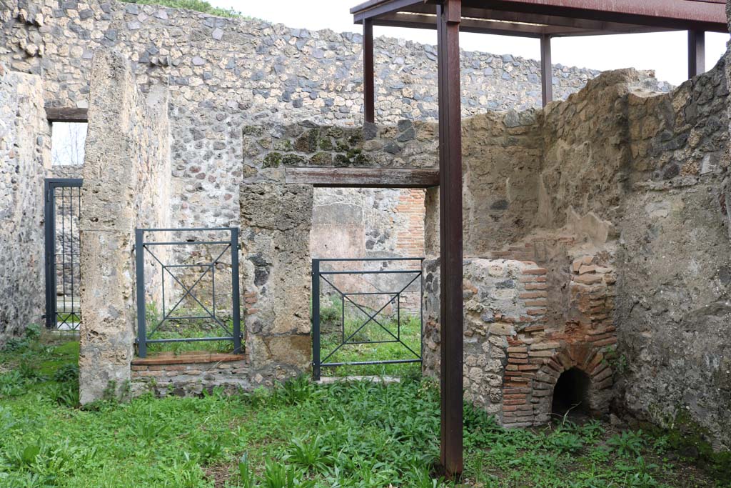 I.20.3 Pompeii. December 2018.
Looking east across rear room towards entrance doorway, on left, and doorways to I.20.2, on right. Photo courtesy of Aude Durand.