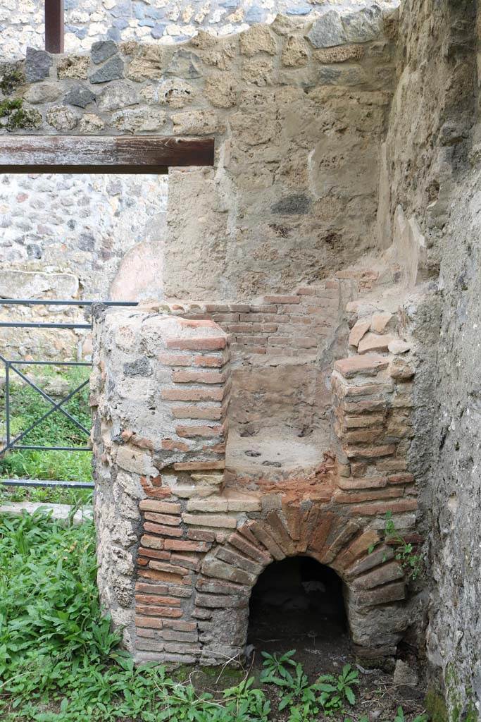 I.20.3 Pompeii. December 2018.
Looking east towards oven in south-east corner of rear-room. Photo courtesy of Aude Durand.
