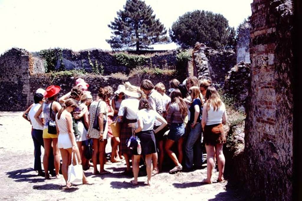 I.20.5 Pompeii. 1972. Examining site of root cavities in south-east corner. Photo by Stanley A. Jashemski.
Source: The Wilhelmina and Stanley A. Jashemski archive in the University of Maryland Library, Special Collections (See collection page) and made available under the Creative Commons Attribution-Non Commercial License v.4. See Licence and use details. J72f0190
