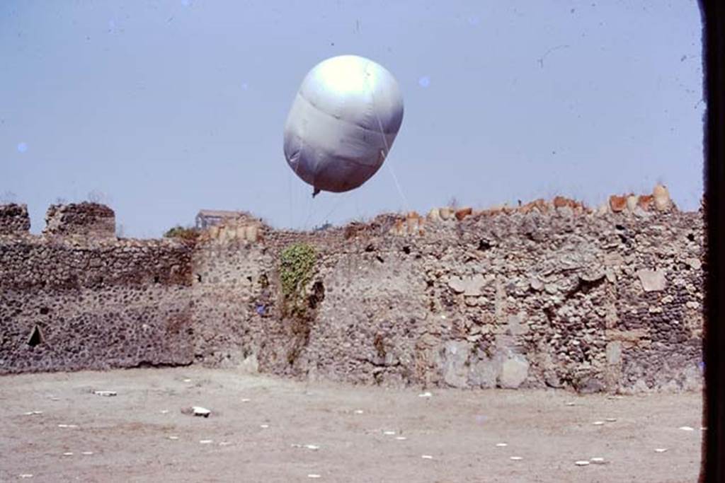 I.20.5 Pompeii. 1974. Looking towards north-west corner, and the “balloon” in Via della Palestra. Photo by Stanley A. Jashemski.
Source: The Wilhelmina and Stanley A. Jashemski archive in the University of Maryland Library, Special Collections (See collection page) and made available under the Creative Commons Attribution-Non Commercial License v.4. See Licence and use details. J74f0442