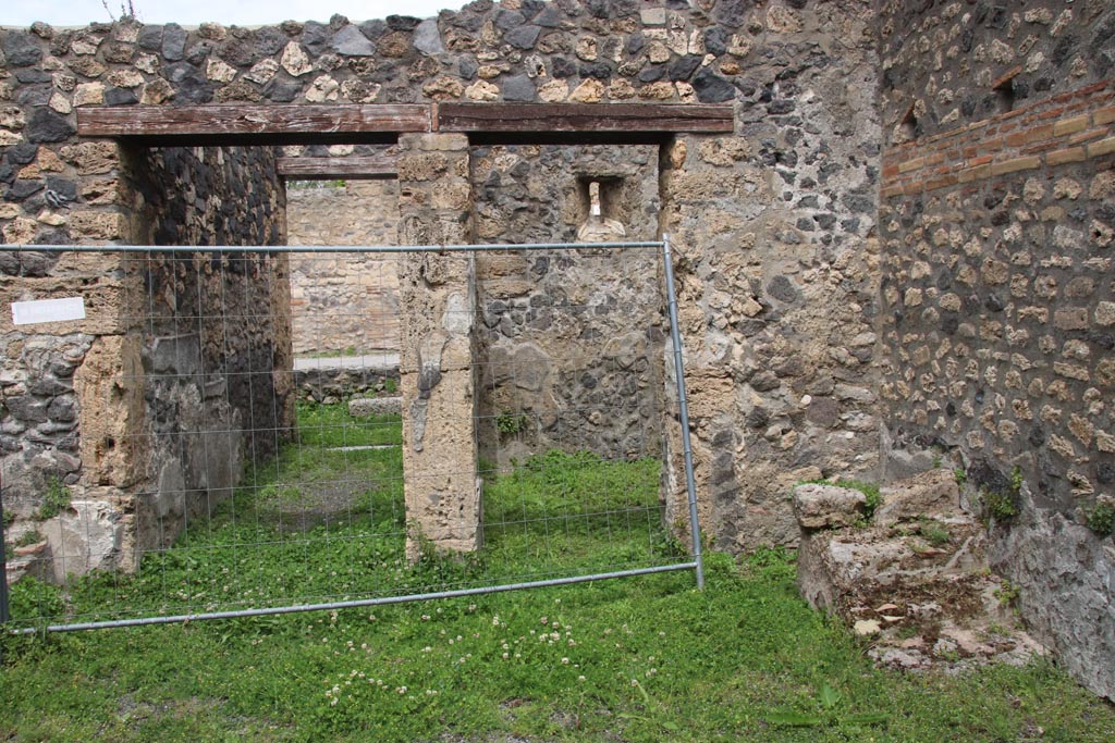 I.21.5 Pompeii. May 2024. Looking north across east side of atrium, towards entrance corridor, on left. Photo courtesy of Klaus Heese.