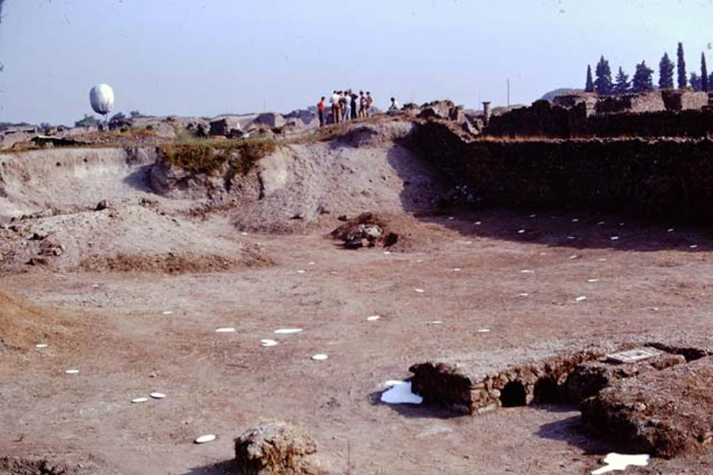 I.22 Pompeii. 1974. Looking north-east across site, with painted spheres marking the root cavities, which would be visible from the approaching �balloon�. Photo by Stanley A. Jashemski.   
Source: The Wilhelmina and Stanley A. Jashemski archive in the University of Maryland Library, Special Collections (See collection page) and made available under the Creative Commons Attribution-Non Commercial License v.4. See Licence and use details. J74f0416

