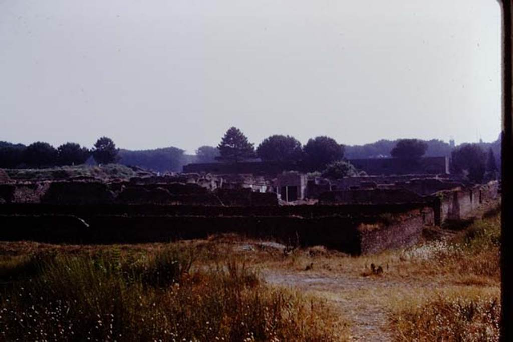I.22 Pompeii. 1972. Looking east from I.22, across south side of I.21 and I.20. Photo by Stanley A. Jashemski.
Source: The Wilhelmina and Stanley A. Jashemski archive in the University of Maryland Library, Special Collections (See collection page) and made available under the Creative Commons Attribution-Non Commercial License v.4. See Licence and use details. J72f0058