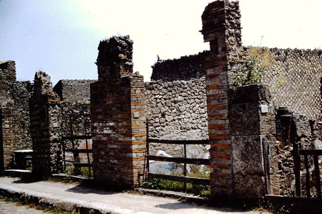 II.1.3 Pompeii. 1961. Looking towards entrance doorway, on right, on south side of Via dell’Abbondanza. On the left is the doorway for II.1.6, II.1.7 and II.1.8. Photo by Stanley A. Jashemski.
Source: The Wilhelmina and Stanley A. Jashemski archive in the University of Maryland Library, Special Collections (See collection page) and made available under the Creative Commons Attribution-Non Commercial License v.4. See Licence and use details.
J61f0638