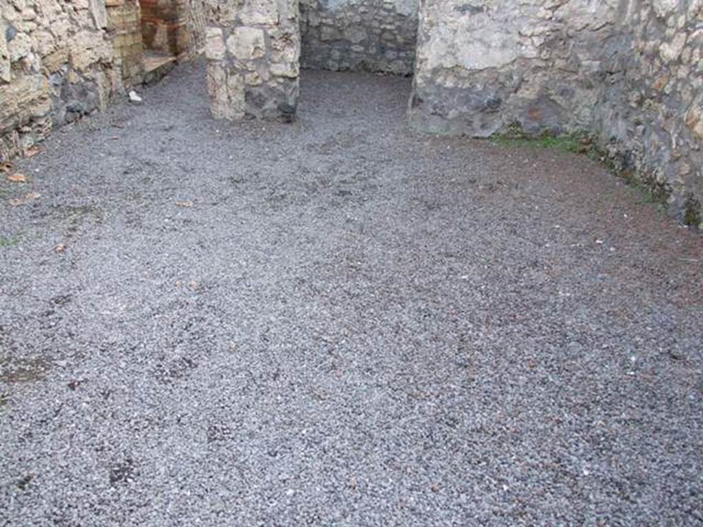 II.1.3. Atrium. South side. The door to the right is into a cubiculum and to the left is a corridor to the rear.