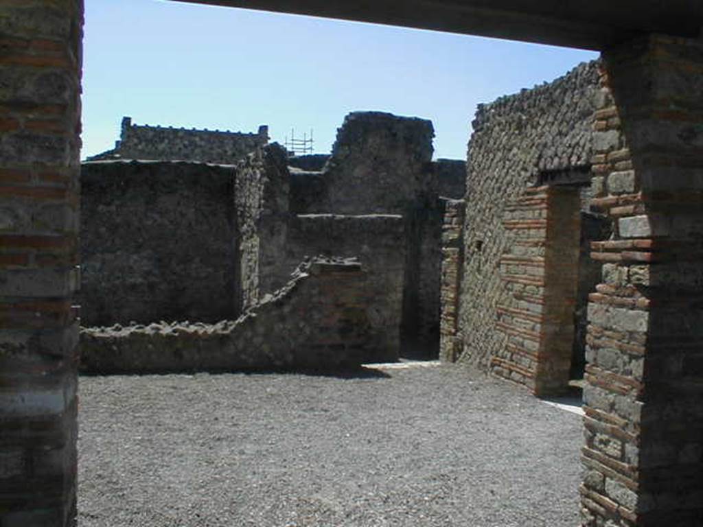 II.1.4 Pompeii. May 2006. Rear room looking west towards II.1.3.