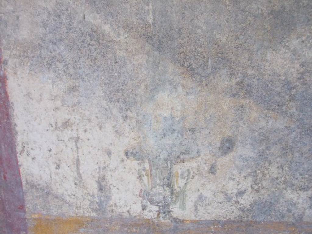 II.1.5 Pompeii. Large Taberna. West wall of rear room. Detail of wall painting of an urn.