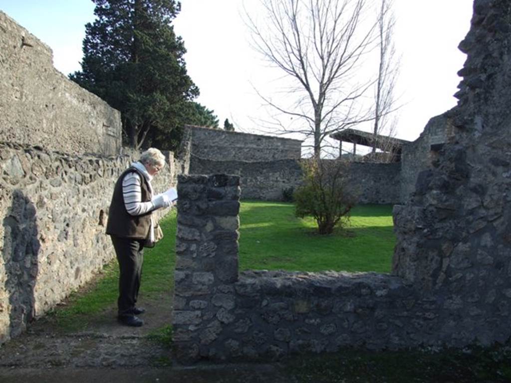 II.1.6 Pompeii. December 2007. South wall of rear room with large window and doorway into garden of II.1.7.