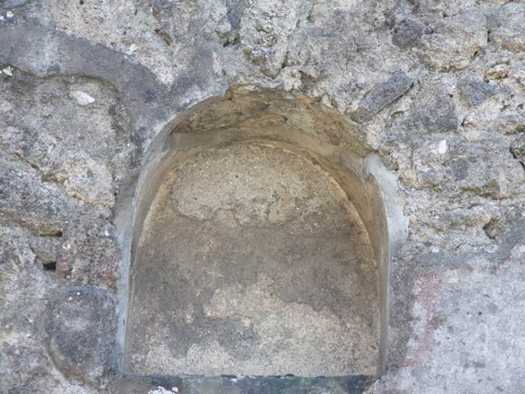 II.1.9 Pompeii. March 2009. Garden area. Niche on west side of rear door II.1.8