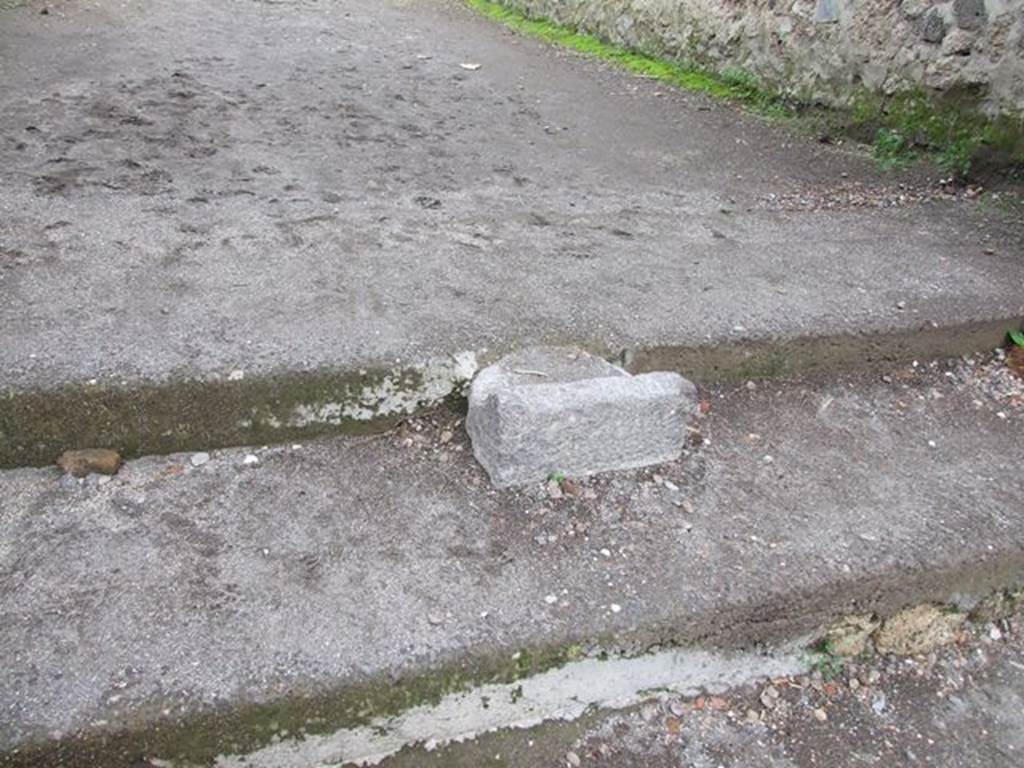 II.1.9 Pompeii. December 2006. Base of portal between II.1.9 and II.9.6 in centre of steps to vicolo. It was originally used for crowd control to Amphitheatre.