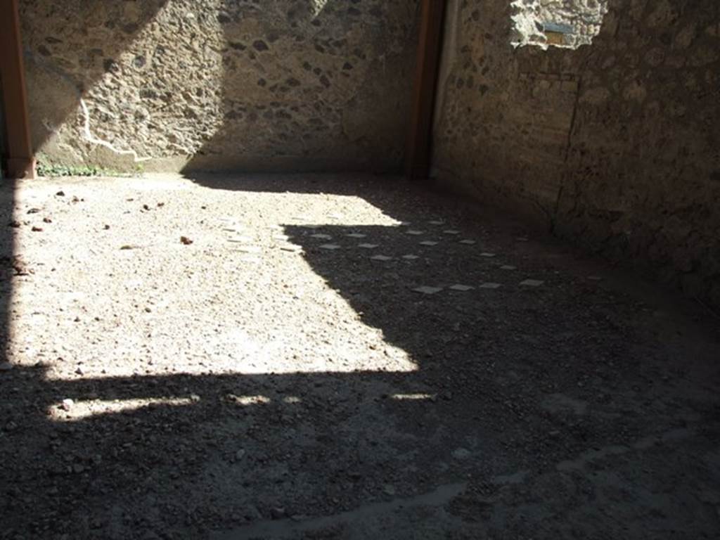 II.1.12 Pompeii. March 2009. Room on south side. Remains of floor.