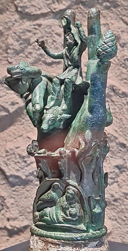 II.1.12 Pompeii. March 2024. Photo courtesy of Giuseppe Ciaramella.
No. 5, Bronze hand of Sabazios (Mano pantea). (Ist century BC).
(5, Mano pantea, bronzo, I sec. a.C. Sabazios).
On display in exhibition in Palaestra entitled – “L’altra Pompei, vite comuni all’ombra del Vesuvio”.