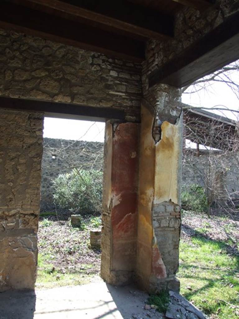 II.1.12 Pompeii. March 2009. Sacellum. Pillar on south side. Various graffiti were found on the pillars on each side of the door.