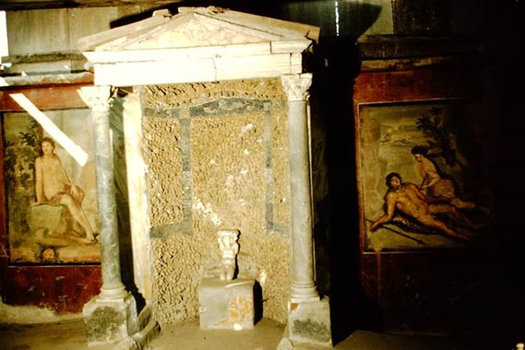 II.2.2 Pompeii. 1957. Room “k”, summer dining room with paintings on east wall, and kneeling satyr placed in aedicula. Photo by Stanley A. Jashemski.
Source: The Wilhelmina and Stanley A. Jashemski archive in the University of Maryland Library, Special Collections (See collection page) and made available under the Creative Commons Attribution-Non Commercial License v.4. See Licence and use details. J57f0473