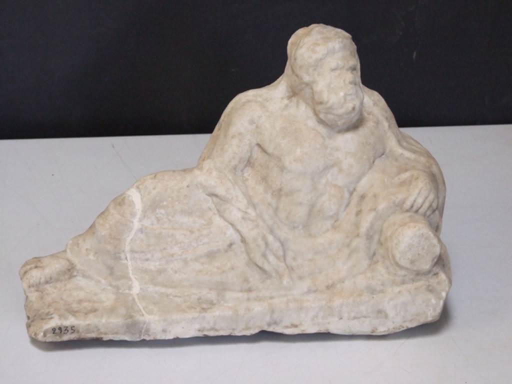II.2.2. Pompeii. March 2009. Room “k”. White marble statuette of a river god. Found on the east side of the upper euripus near the Biclinium in the garden in 1920. SAP inventory number: 2935.