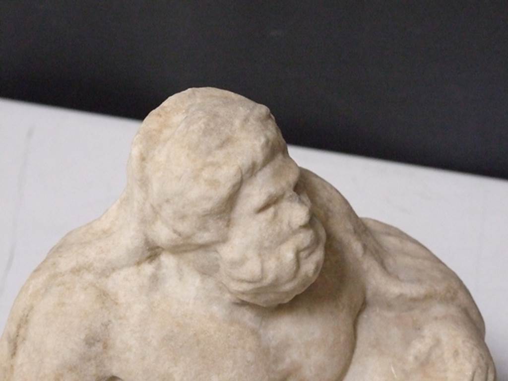 II.2.2. Pompeii. March 2009. Room “k”. White marble statuette of a river god. Detail of face. SAP inventory number: 2935.