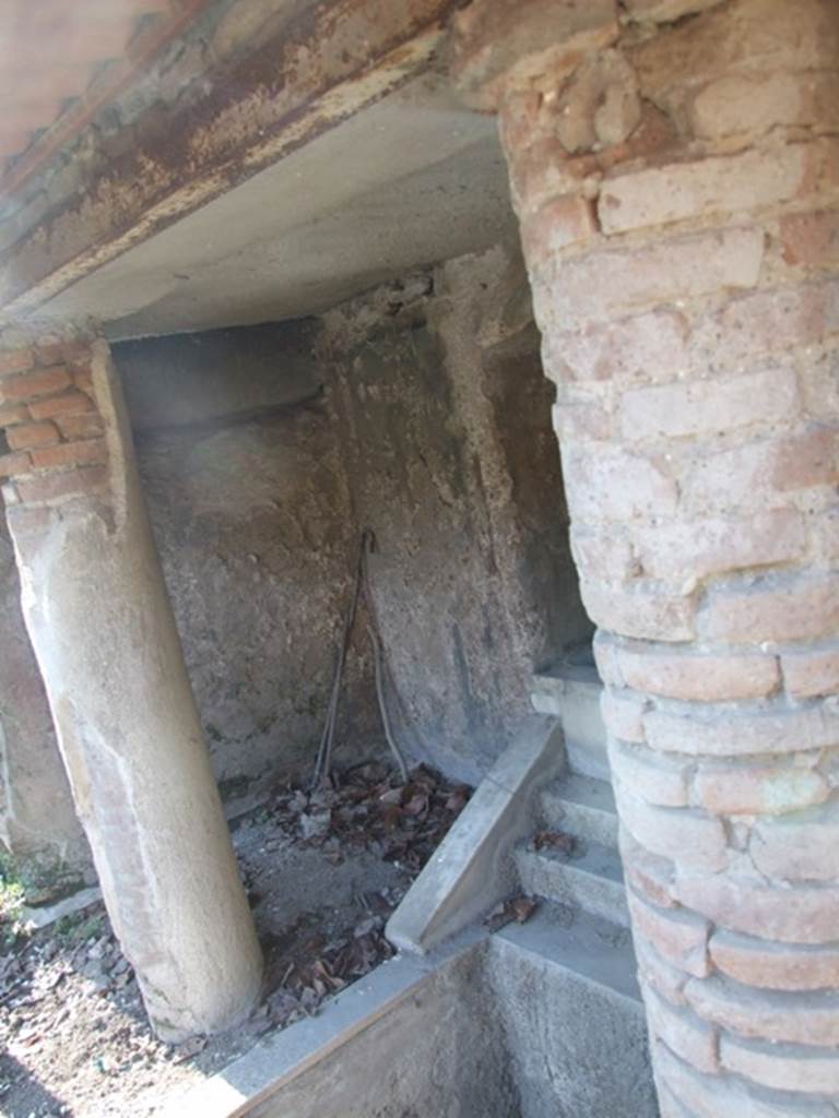 II.2.2 Pompeii. March 2009. Room 13. Garden. Looking north west across the steps from niche fountain.