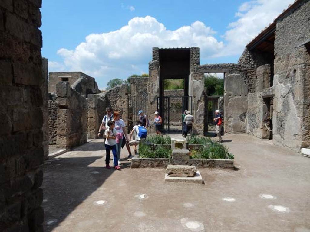 II.2.2 Pompeii. May 2016. Room 2, looking north across atrium to entrance. Photo courtesy of Buzz Ferebee.
