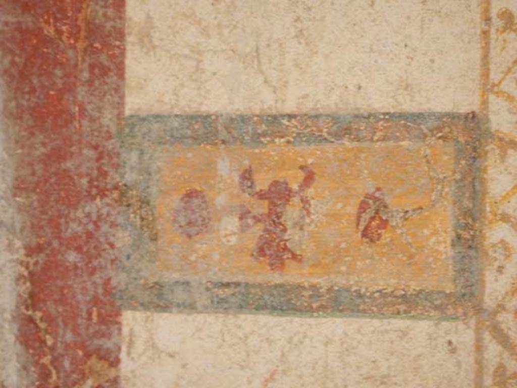 II.2.2 Pompeii. May 2016. Room “d”, detail of painted panel at south end of west wall.
Photo courtesy of Buzz Ferebee.