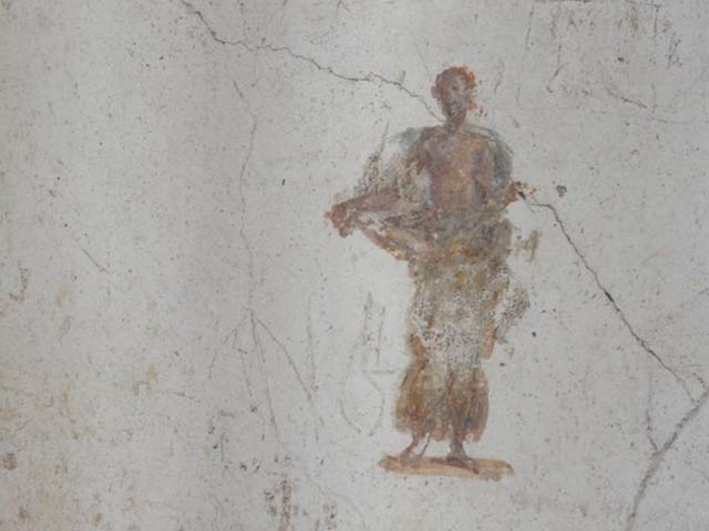 II.2.2 Pompeii. May 2016. Room “f”, painted figure in centre of panel at east end of south wall. Photo courtesy of Buzz Ferebee.