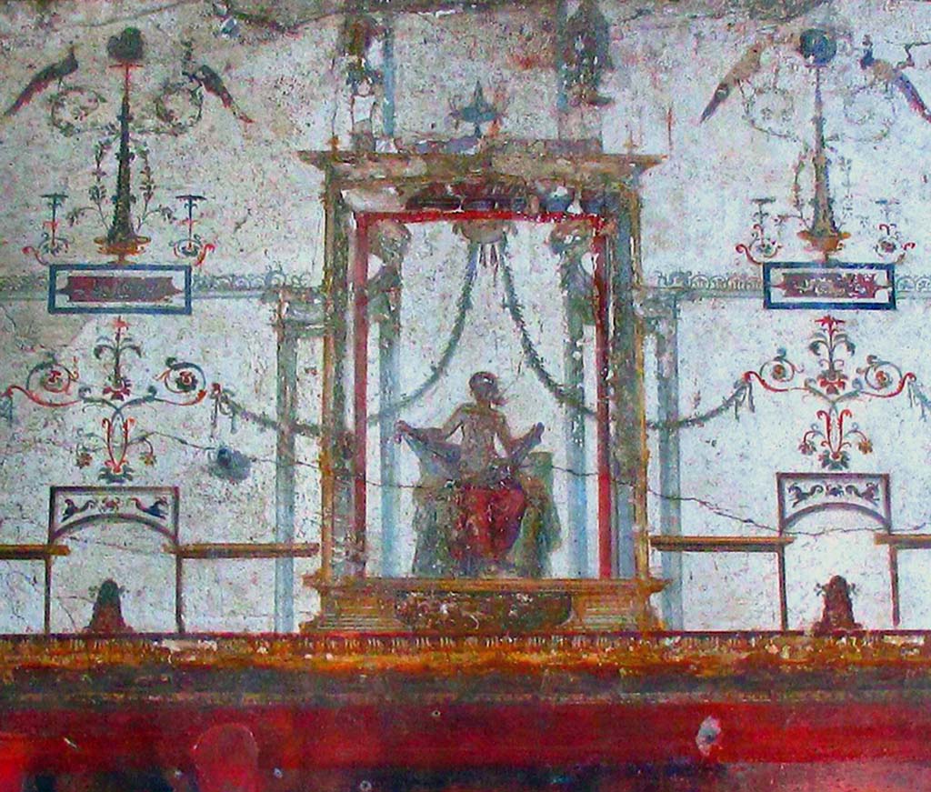 II.2.2 Pompeii. April 2016.
Room “f”, detail of upper centre of west wall with fresco in Fourth style of seated figure. Photo courtesy of Davide Peluso.
