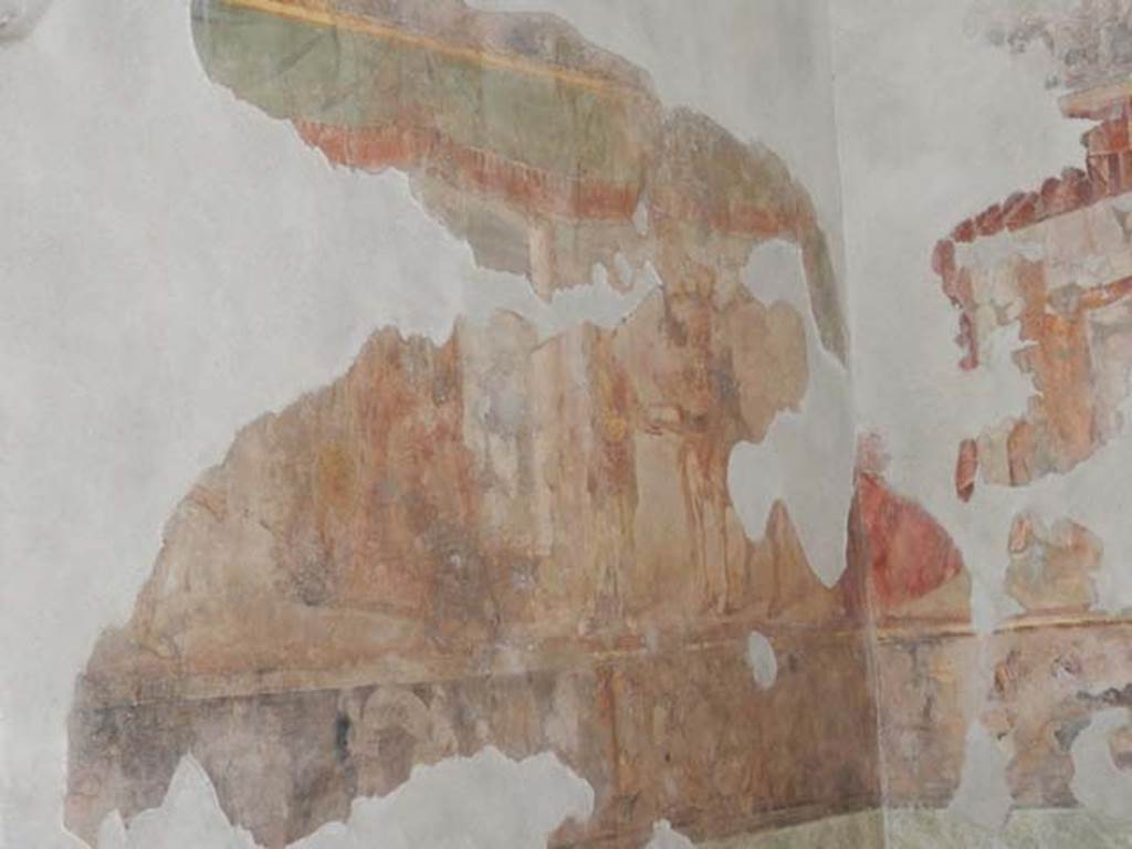 II.2.2 Pompeii. May 2016. Room “h”, detail from north end of west wall.
From left to right in the large frieze are three episodes.
Heracles on the pyre, Deianeira and Nessus and Heracles, Deianeira and Nessus.
Photo courtesy of Buzz Ferebee.
See Lorenz K., 2013. In Epic Visions: Visuality in Greek and Latin Epic and its Reception. Cambridge U.P., p. 225.