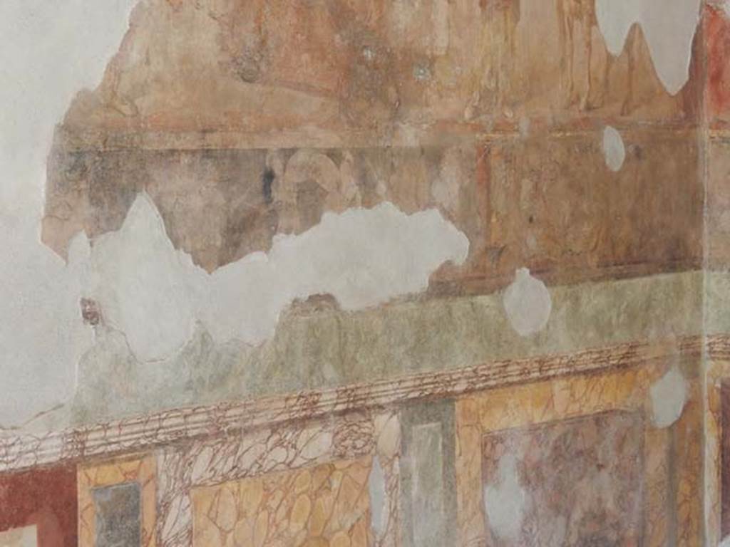 II.2.2 Pompeii. May 2016. Room “h”, west wall, showing narrow frieze above the marbled zoccolo.
Photo courtesy of Buzz Ferebee.
This shows two combat scenes. On the left is the battle at the wall. Right is the battle at the ships.
See Lorenz K., 2013. In Epic Visions: Visuality in Greek and Latin Epic and its Reception. Cambridge U.P., p. 225.