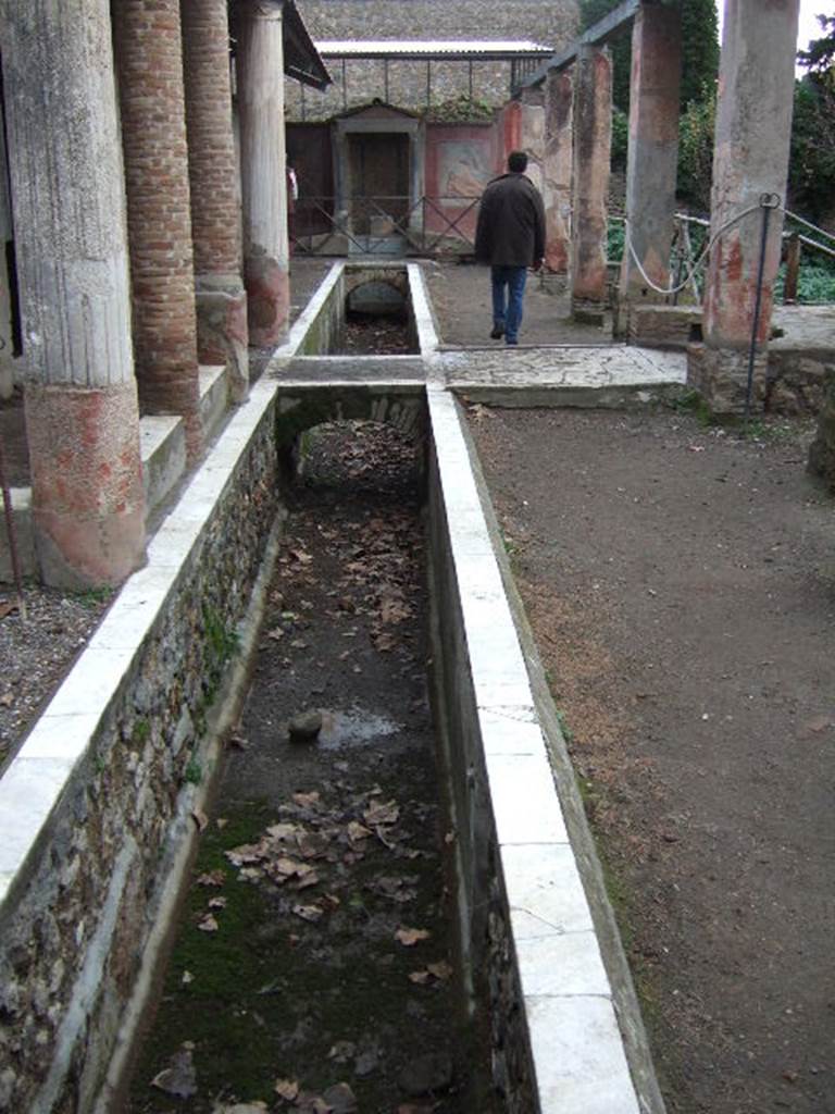 II.2.2 Pompeii. December 2005. Room “i”. Looking east along upper euripus water feature.