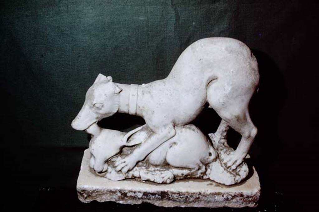 II.2.2 Pompeii. 1978. Room “i”. Marble group of dog and faun. Photo by Stanley A. Jashemski.
Source: The Wilhelmina and Stanley A. Jashemski archive in the University of Maryland Library, Special Collections (See collection page) and made available under the Creative Commons Attribution-Non Commercial License v.4. See Licence and use details. J78f0179