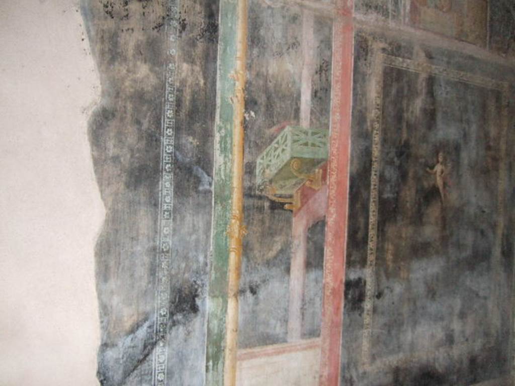 II.3.3 Pompeii. December 2005. Room 6, south wall of triclinium with wall painting of balcony.