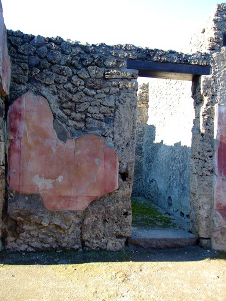 II.3.3 Pompeii. March 2009. Doorway to Room 7.