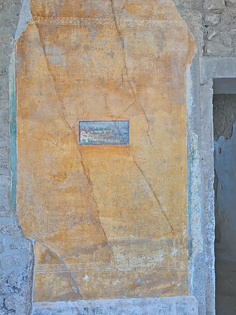 II.3.3 Pompeii. March 2024.
Painted panel on east wall in north-east corner of room 11. Photo courtesy of Giuseppe Ciaramella.