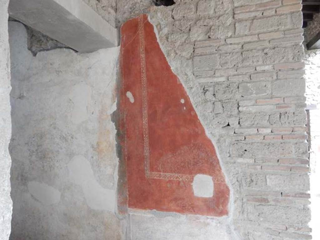 II.3.3 Pompeii. May 2016.
Detail of painted south wall in north-east corner of room 11, near doorway to room 8.
Photo courtesy of Buzz Ferebee.