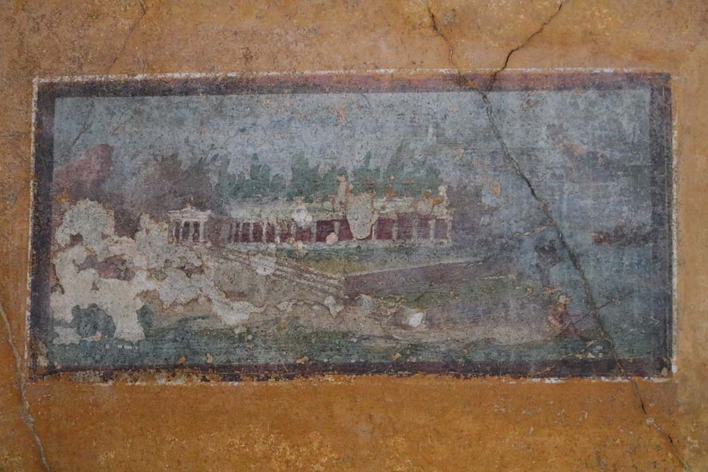 II.3.3 Pompeii. December 2018.
Painted panel, architectural landscape, in north-east corner of room 11. Photo courtesy of Aude Durand.
