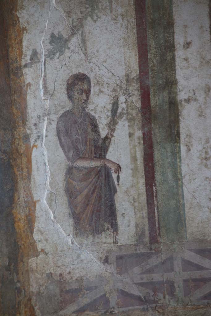 II.3.3 Pompeii. September 2017. Room 9, painted figure on west end of north wall.
Photo courtesy of Klaus Heese.