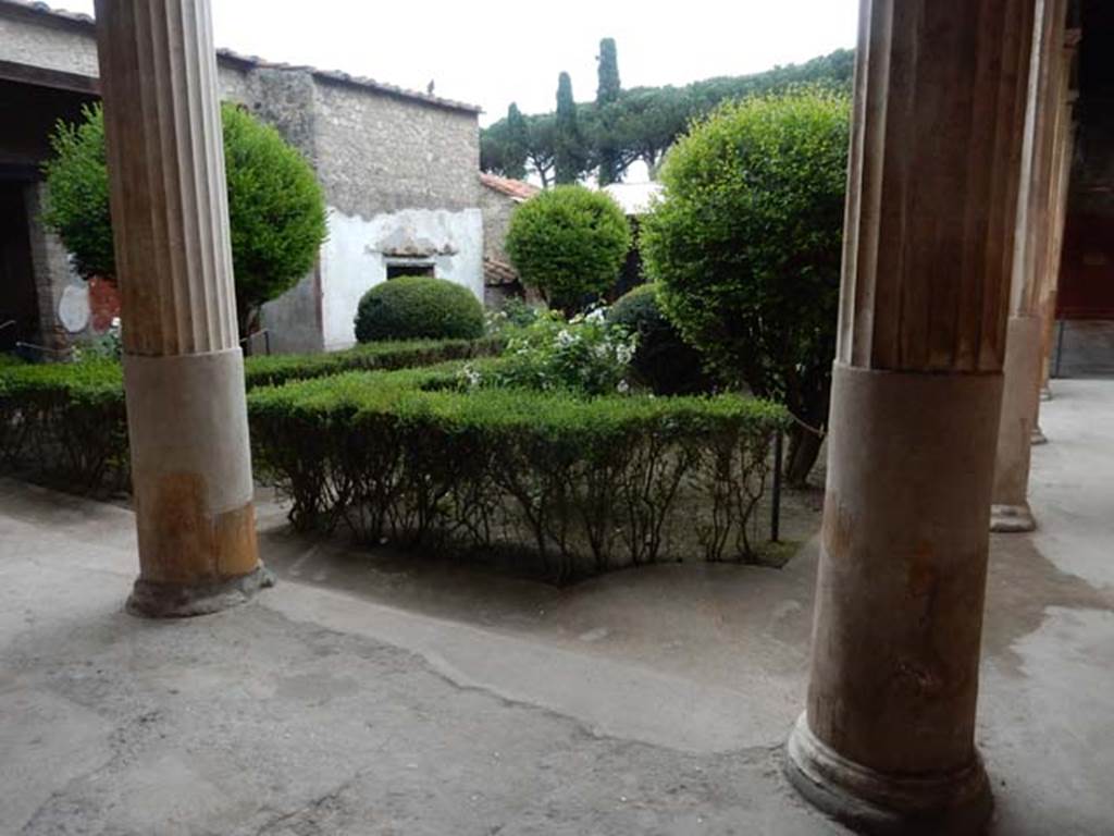 II.3.3 Pompeii. May 2016. Room 11, north portico. Looking south-east across garden area from near doorway to room 5. Photo courtesy of Buzz Ferebee.