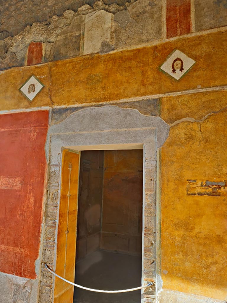 II.3.3 Pompeii. March 2024.
Room 11, north end of upper west wall of west portico, above doorway to room 12. Photo courtesy of Giuseppe Ciaramella.