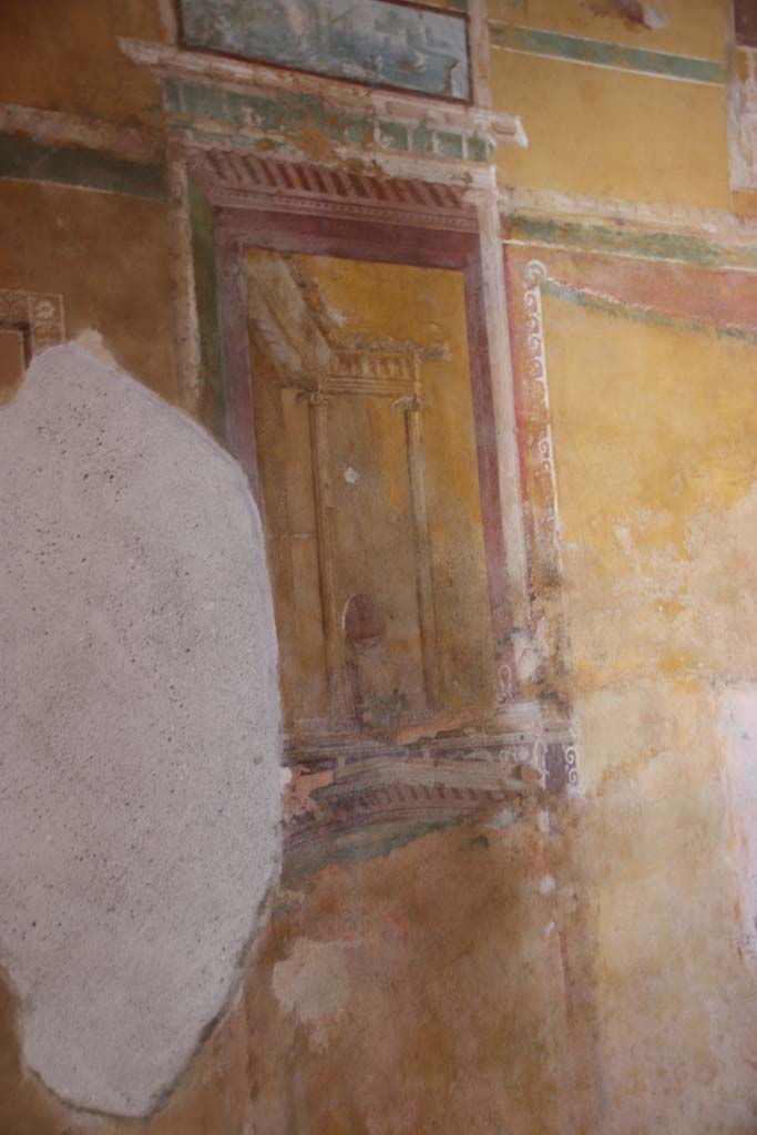 II.3.3 Pompeii. September 2017. Room 12, south wall, detail of painted panel on east side of central painting.
Photo courtesy of Klaus Heese.