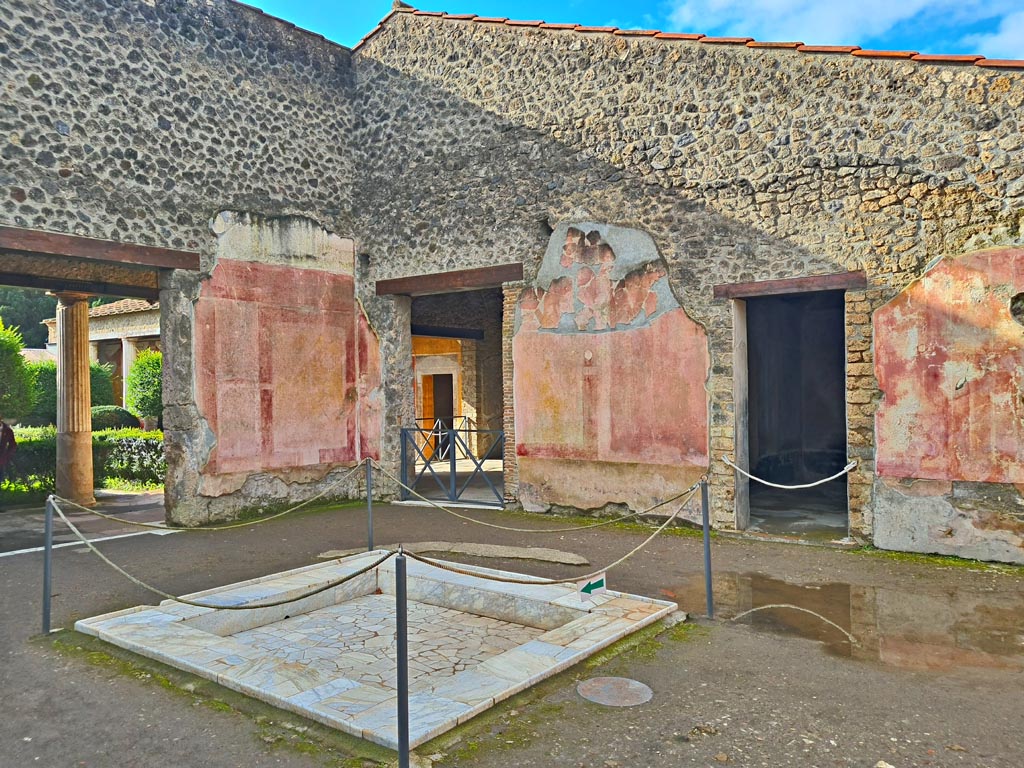 II.3.3 Pompeii. March 2024.
Room 11, north-east corner, with doorways to rooms 8 and 9. Photo courtesy of Giuseppe Ciaramella.
