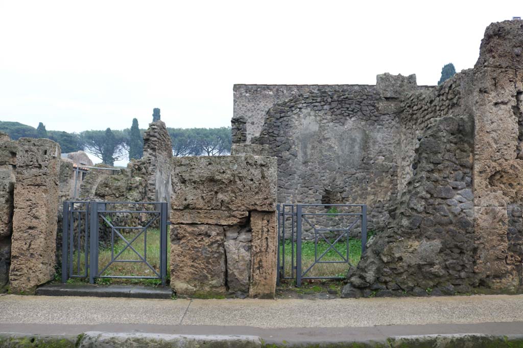 II.3.4 Pompeii. December 2018. Looking south towards entrance doorways.
On the right is the doorway originally known as II.3.3A, but now recognised as part of II.3.4. Photo courtesy of Aude Durand.