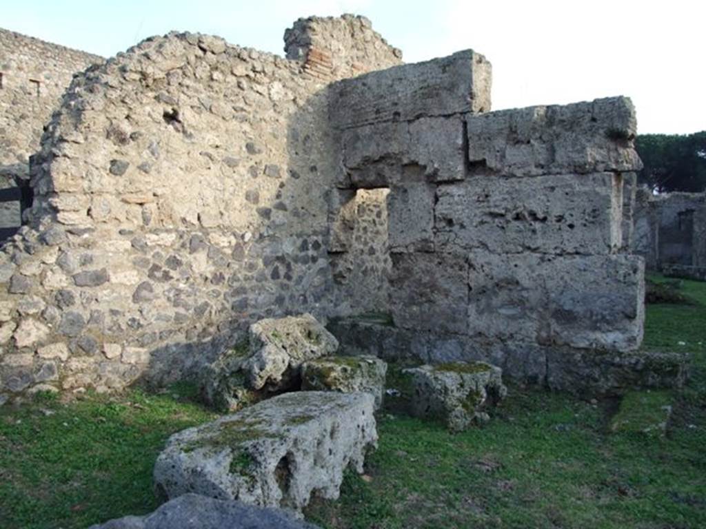 II.3.5 Pompeii. December 2007. South-east corner of bar room with doorway into small room or cupboard.