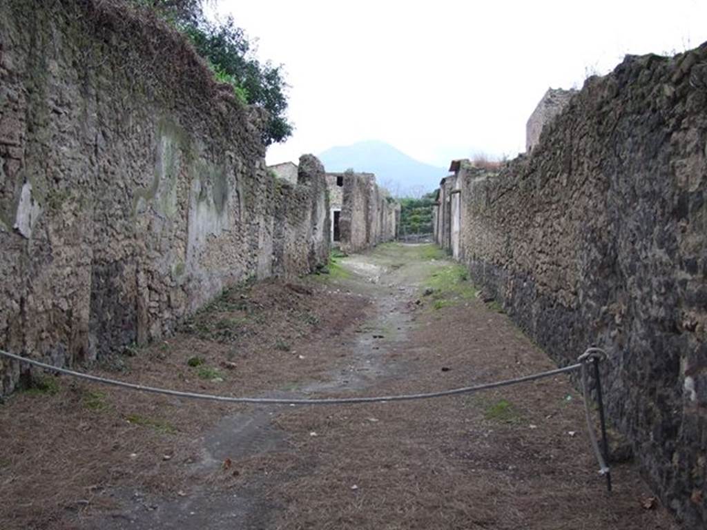 II.3 Pompeii. December 2006. Roadway, looking north. II.4