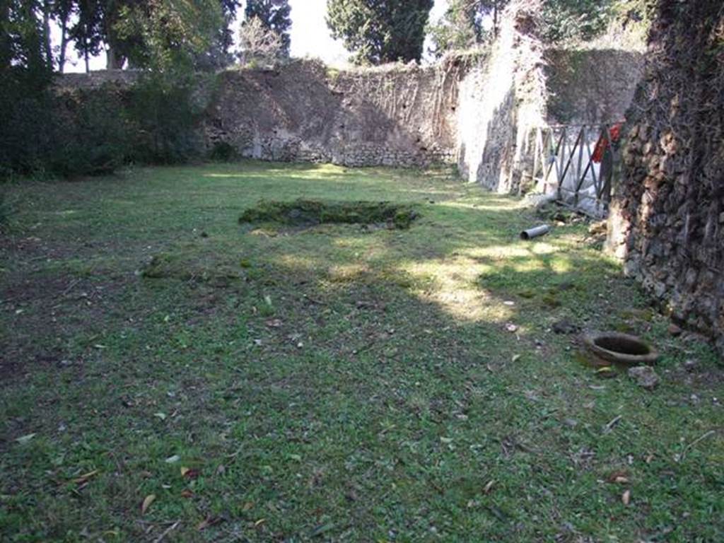 II.3.7 Pompeii. March 2009. Garden area, looking west. Remains of masonry triclinium.